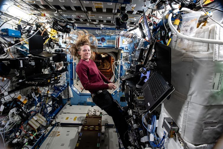 file-20250516-62-xhfcdu An astronaut floats weightless aboard the International Space Station.